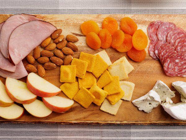 HighKey Gluten free, low sugar cheese crackers on a grazing board