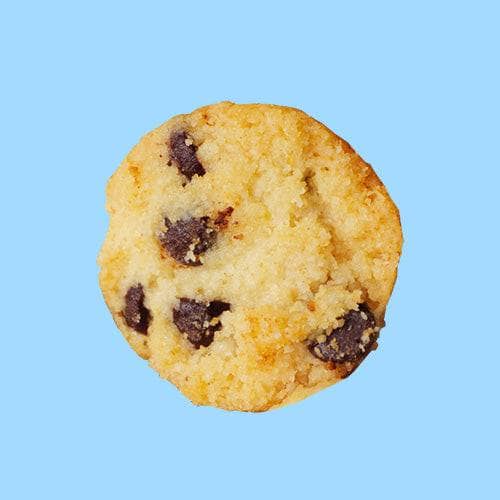 Highkey gluten free low sugar mini chocolate chip cookie on a blue background